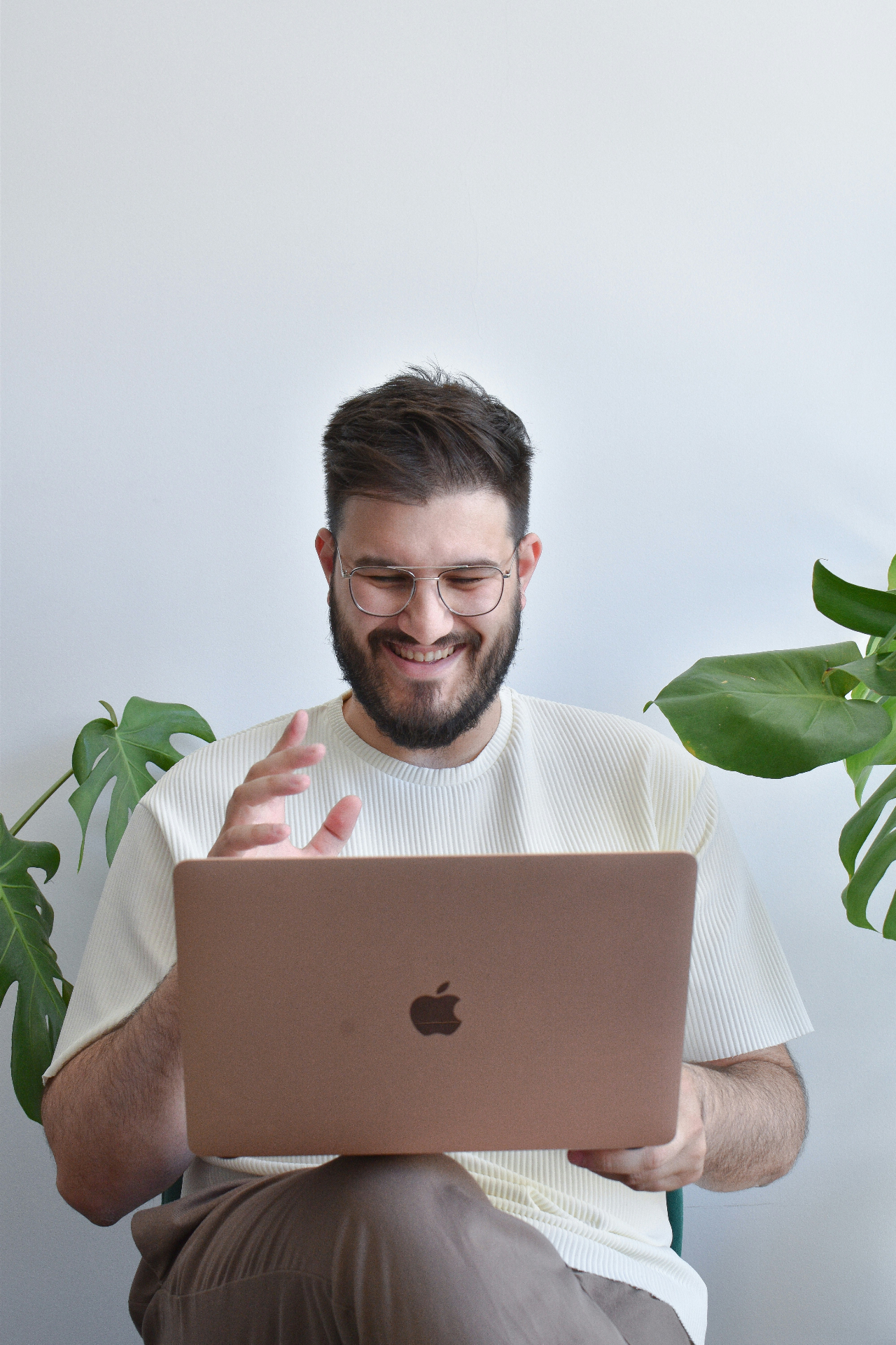 A client on a bright, comfortable telehealth video session