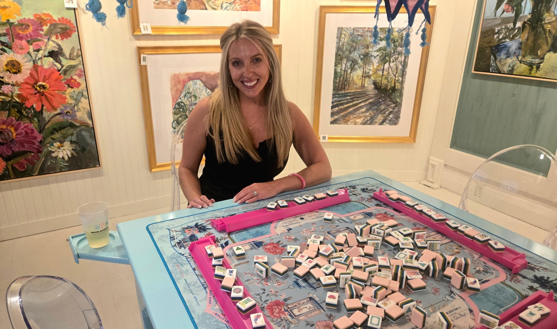 Jenelle at her mahjong table at home